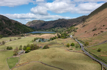 elevated view of the bottom of the kirkstone pass lake district cumbria uk looking north towards brotherswater and place fell sunny spring day