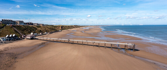 aerial panoramic view of the pier cliff lift and seafront at saltburn north youkshire uk