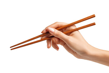 A hand holds wooden chopsticks