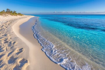 Pristine beach meets turquoise sea
