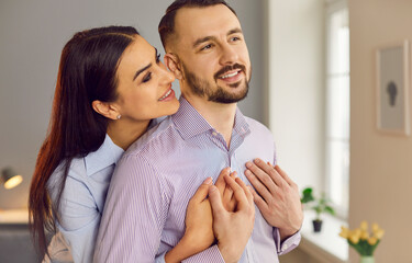 Portrait of a happy couple in a tender embrace, radiating happiness and love. Perfect depiction of romance, smiles, and the joy of being together, ideal for celebrating Valentine Day.