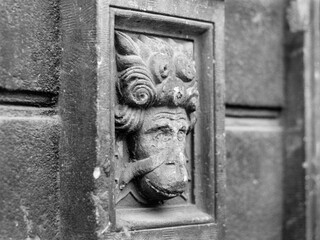 Stone detail of an old house in Poznan, Poland. Analog photography. Vintage style. 
