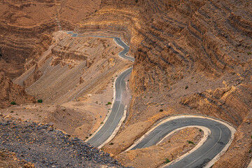 The famous Dades Gorge Road Morocco, offering breathtaking views of the winding asphalt path through ancient mountain strata