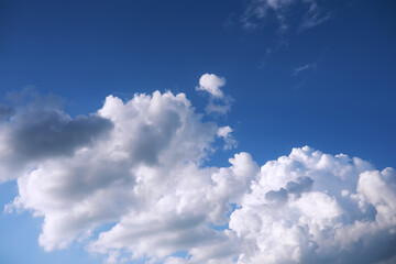 The sky is blue with clouds, beautiful by nature.