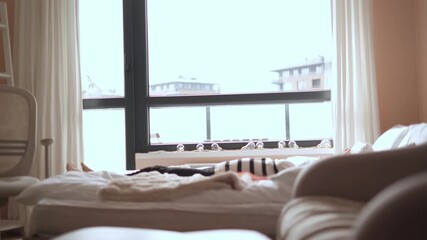 On a peaceful and tranquil morning, an individual gently stretches and rejuvenates in a cozy room filled with warm sunlight, fully embodying the essence of selfcare and enhancing overall wellbeing