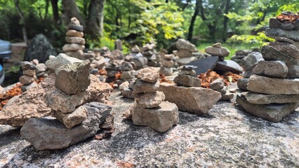 Stone cairn, Stacked stones, Rock tower, Balance stones, Piled rocks, Nature meditation, Zen stones, Wish stone, Spiritual cairn, Traditional stone stacking
