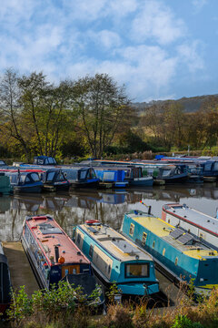 Narrow boats barges and houseboats canl marina england UK