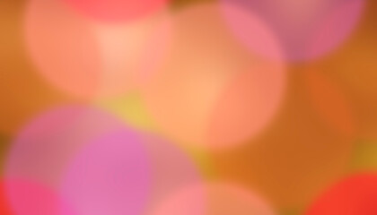 Soft focus bokeh lights in warm orange pink and purple hues background out of focus