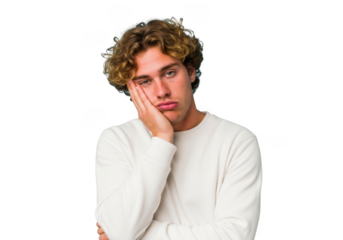 Bored young man with curly hair leaning on hand looking unhappy, frustrated, and tired stock photo isolated on transparent background