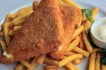 Smazeny syr - Czech delicacy - fried Cheese and chips on a plate