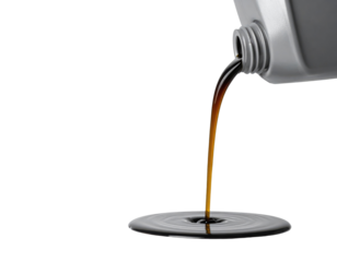 A pouring liquid from a gray container, creating ripples as it flows into a pool below.