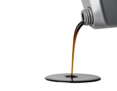 A pouring liquid from a gray container, creating ripples as it flows into a pool below.