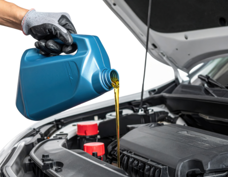 A person pours engine oil from a blue container into a car engine, highlighting the importance of vehicle maintenance.