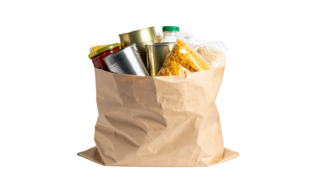 A paper bag filled with various canned and packaged food items, showcasing a variety of groceries.