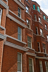 Brick Buildings with White Trim and Windows  in London, UK.