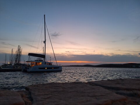 sunset in the harbor of Paros, Greece