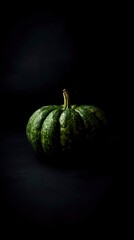 Dark Moody Green Pumpkin on Black Background - Autumnal Still Life Photography