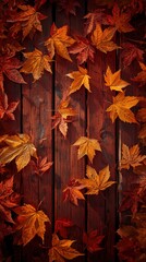 Autumnal Maple Leaves on Rustic Wooden Background