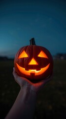 Jack-o'-lantern Held in Hand at Dusk