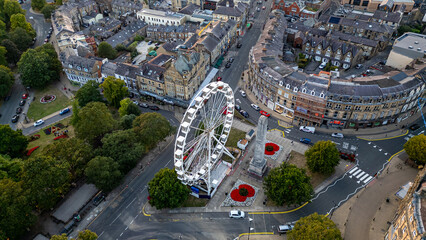 Town Square Ferris Wheel with Monument and Trees  in Harrogate, UK.