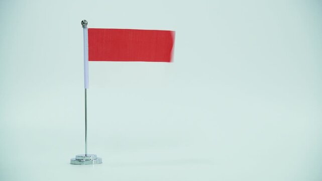 Indonesian flag waving on white background
