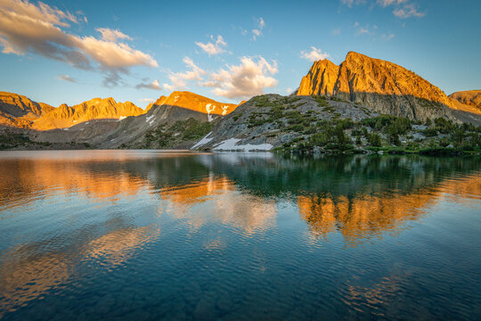 Mountain reflections in Duck Lake at Sunset in Sierra Nevada Mountains near Mammoth, California, USA
