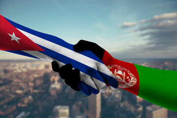 Shaking hands Cuba and Afghanistan