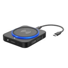 Obraz premium Modern black wireless charging pad with blue led light isolated on transparent background