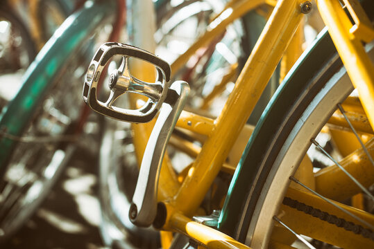Close-up of a bike pedal on a row of bicycles parked side by side, Silicon Valley, California, USA