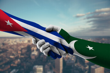 Shaking hands Cuba and Pakistan