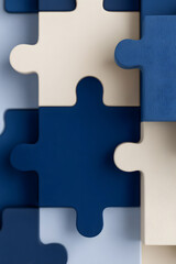 Blue and white puzzle pieces abstract background