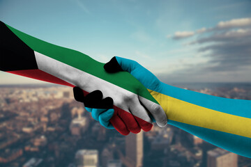 Shaking hands Kuwait and_Bahamas