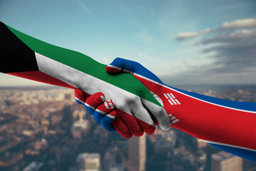 Shaking hands Kuwait and_Korea, North