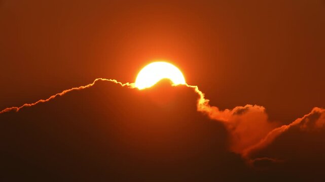 Witchcraft sun in the dark clouds. Astrology and pagan religion concept. Witches covens mythology. Cycle of life and death. Spiritual magic witchcraft traditions and energy enlightenment.