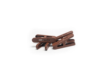Stacked Brown Plastic Clips Isolated on White