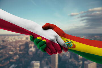 Shaking hands Poland and_Bolivia