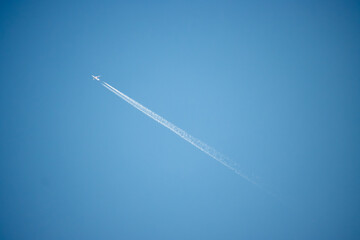 airplane in the blue sky