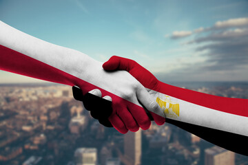 Shaking hands Poland and_Egypt