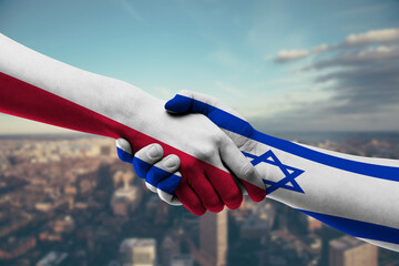 Shaking hands Poland and_Israel