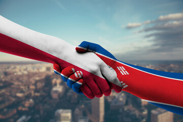 Shaking hands Poland and_Korea, North