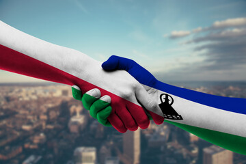 Shaking hands Poland and_Lesotho