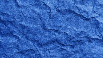 Blue construction paper texture with rough grunge abstract background pattern for modern wallpaper and creative design projects