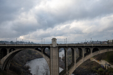 horizontal shot of monroe street bridge in Spokane, Washington by the spokane falls