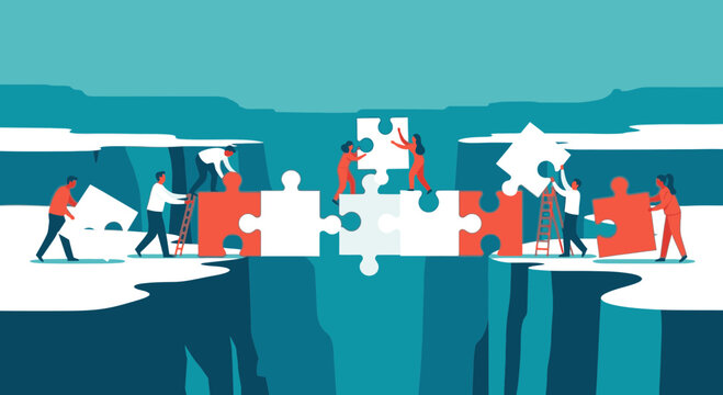 A collaborative team of people building a bridge with large jigsaw puzzle pieces to connect two cliffs over a chasm.
