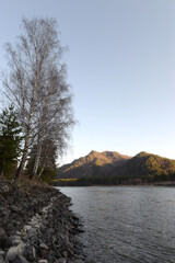 In the evening on the Katun mountain river. Altai Republic