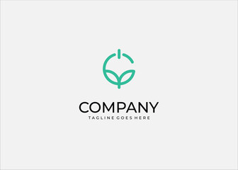 Fototapeta premium Minimalist eco-friendly logo design combining a power button with leaf symbol. Modern green technology vector icon.