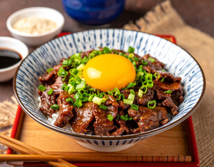 Japanese Beef Rice Bowl with Raw Egg Yolk and Green Onions