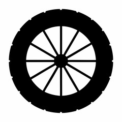 Black and white image featuring a car tire with simple circular design