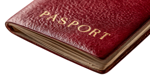 Red leather passport detail. Travel, immigration, journey concept.