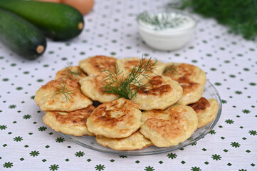 plate of vegetarian zucchini pancakes on the table